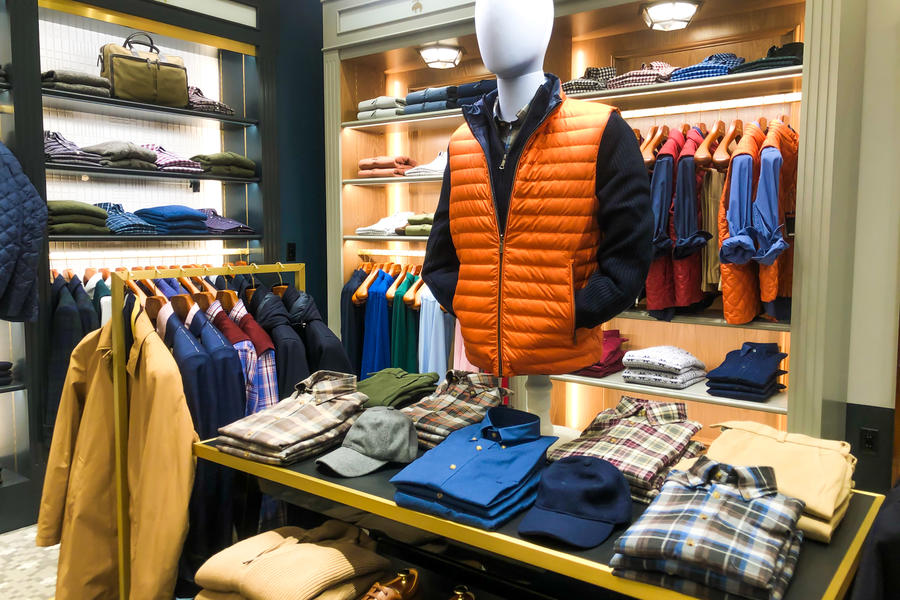 Orange vest and blue button up 