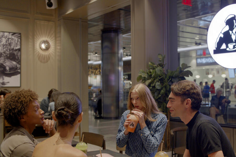 group of people sitting at Joe & The Juice