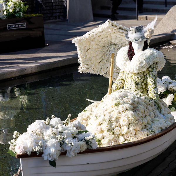 white floral mannequin in boat 