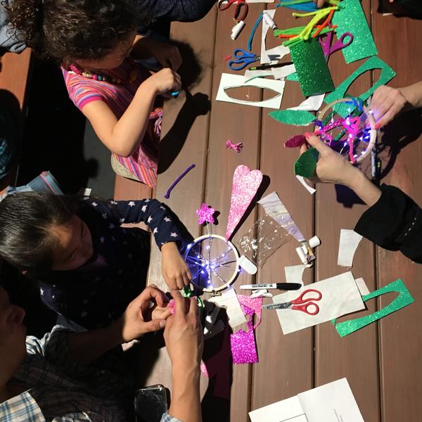 children making crafts on a table