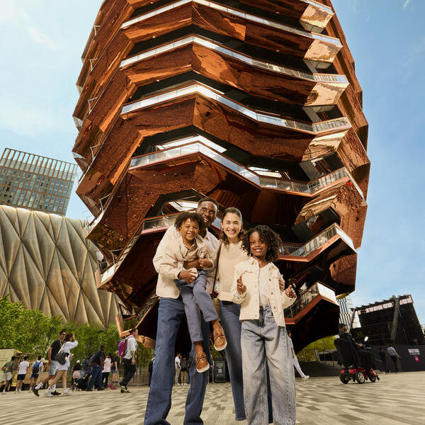 Family posing outside Vessel 