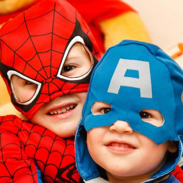 two young kids in Halloween Costumes