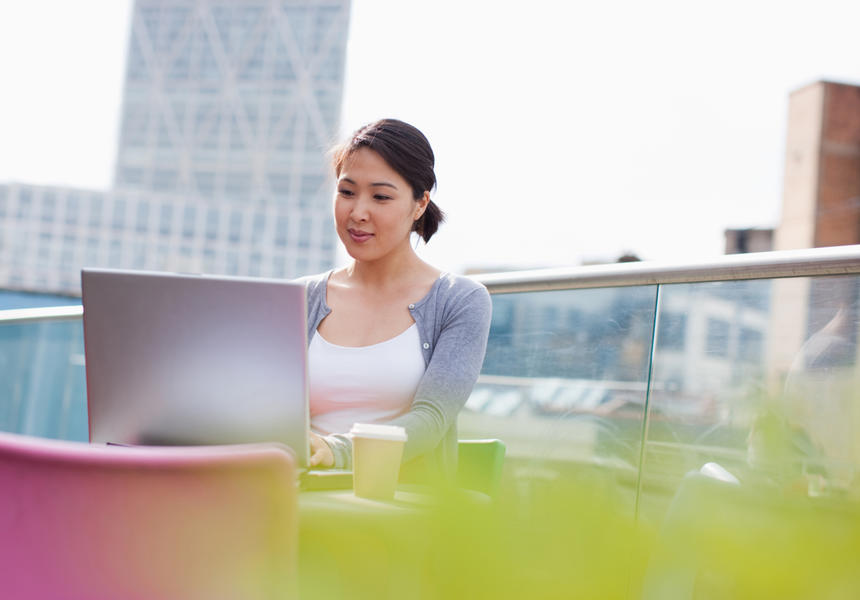 Image of Woman Working on Terrace